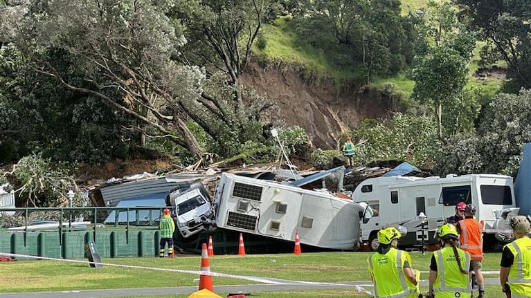 Caravans, the toilet block, cars, and tents at the Mt Maunganui Campground have been by slips and fallen trees.