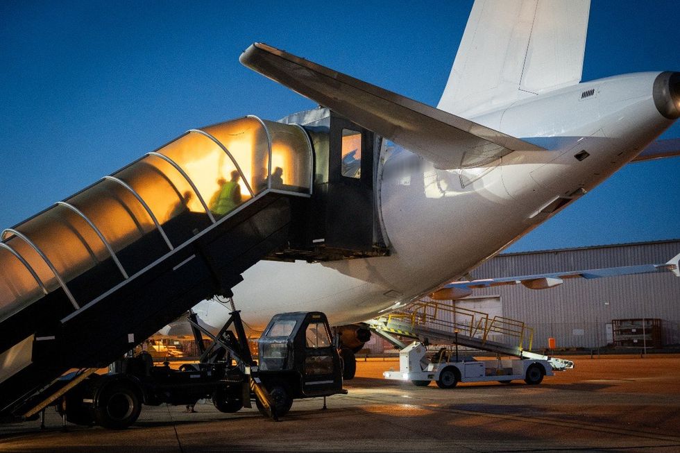 Migrant return flight