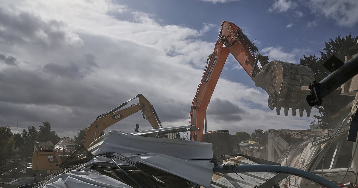 Israeli crews begin bulldozing headquarters of UN agency for Palestinian refugees in east Jerusalem