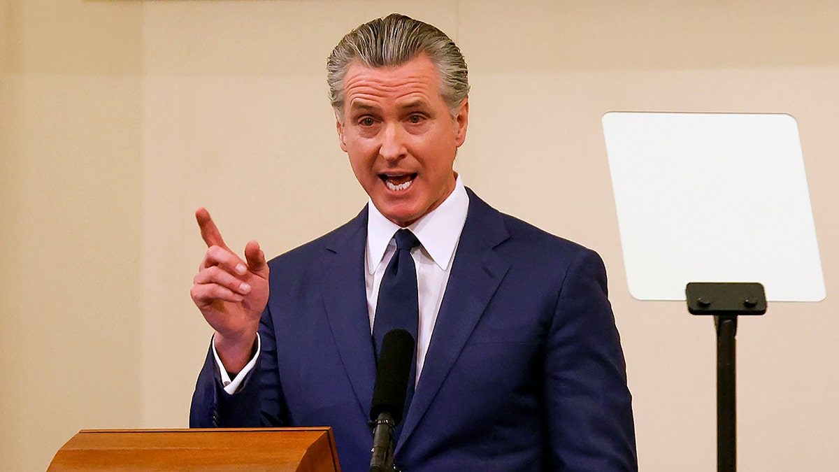 Gov. Gavin Newsom delivers State of the State address at the dais