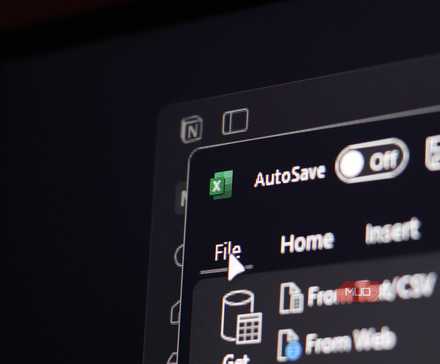 Notion and Excel open on a Windows 11 PC