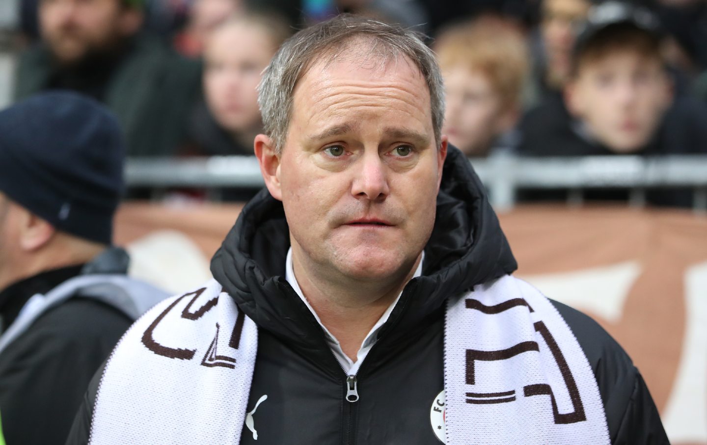 Oke Göttlich, the president of FC St. Pauli, looks on before the Bundesliga match between FC St. Pauli 1910 and FC Bayern MĂŒnchen at Millerntor Stadium on November 9, 2024, in Hamburg, Germany.