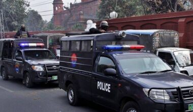 Pakistani police vehicles on patrol with armed officers, ensuring security in the area. (Photo Credit: DAILY PAKISTAN)