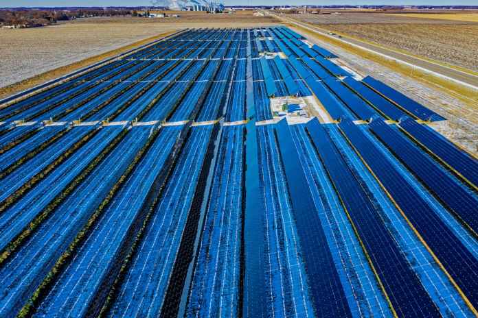 Representational image. Credit: Canva aerial photography of blue solar panels