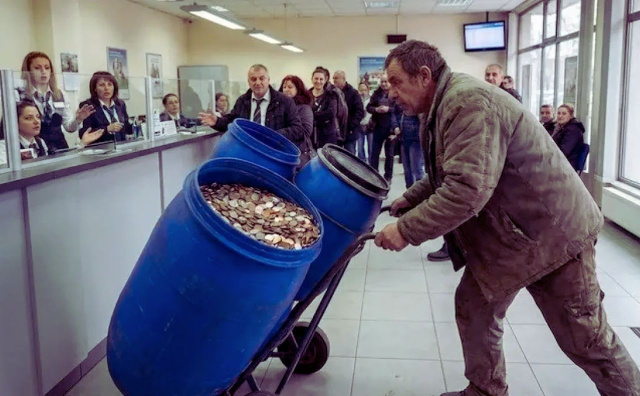 Bulgaria: Ridiculous Scenes as a Citizen Brings Canisters Filled with Coins to a Bank in Bulgaria