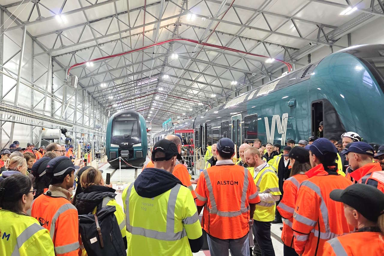 Employees and industry partners gathering in Grorud depot to celebrate the 100th ERTMS-equipped train. // Credit: Alstom