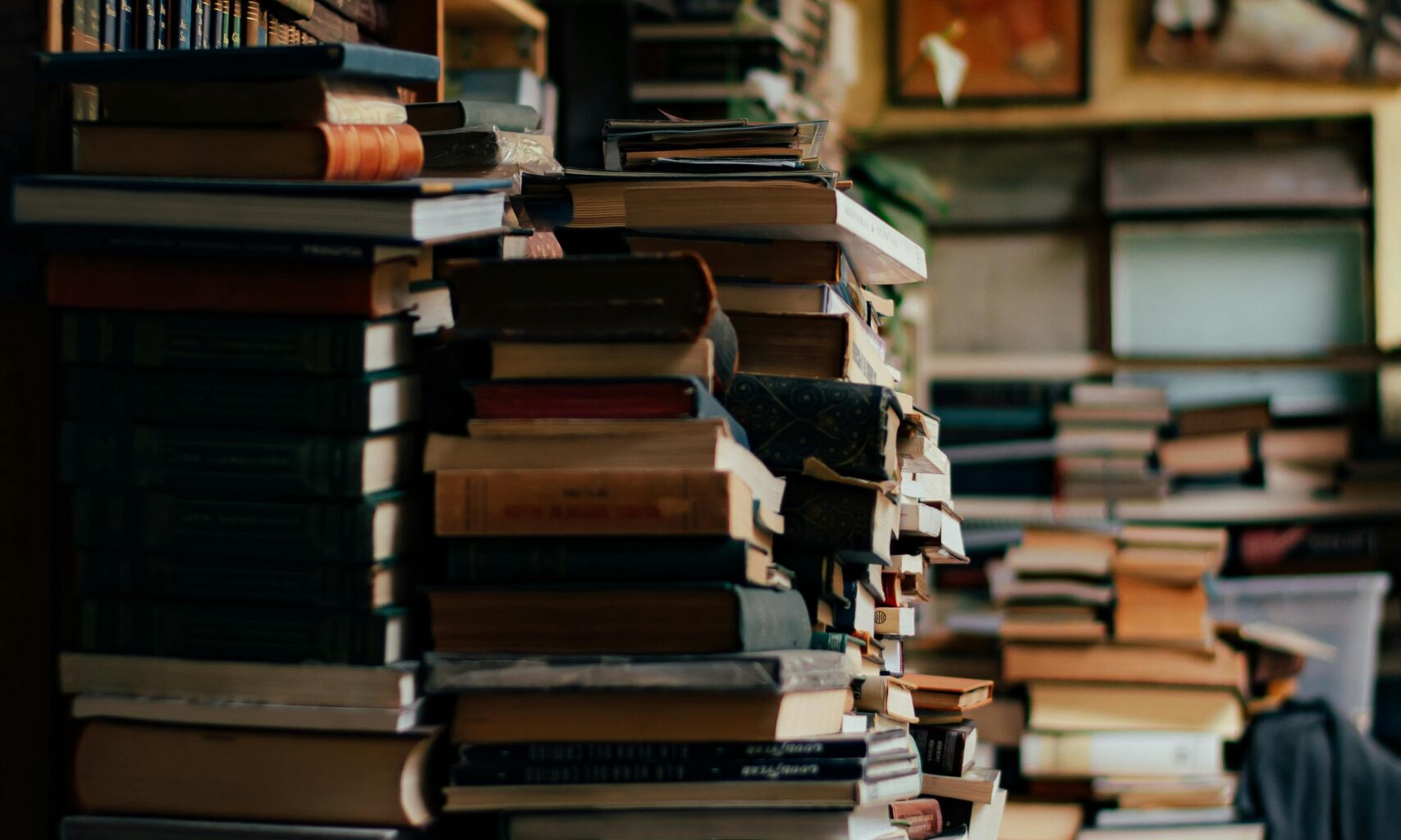 Piles of books in a bookstore