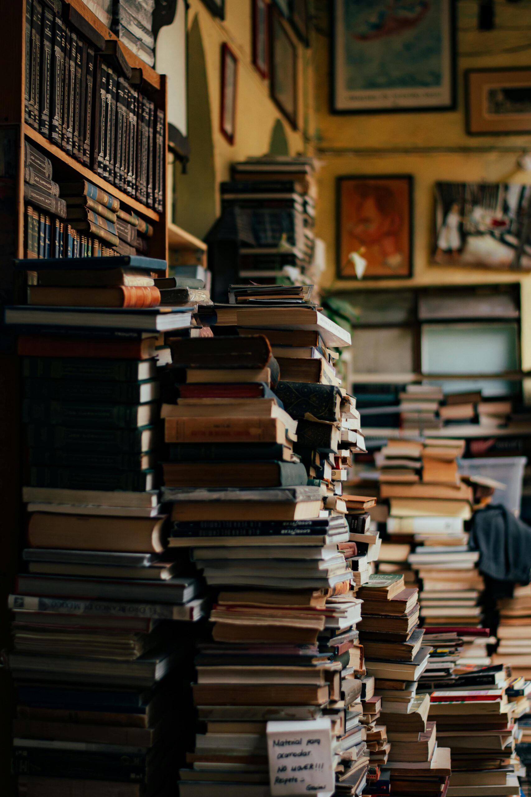 Piles of books in a bookstore