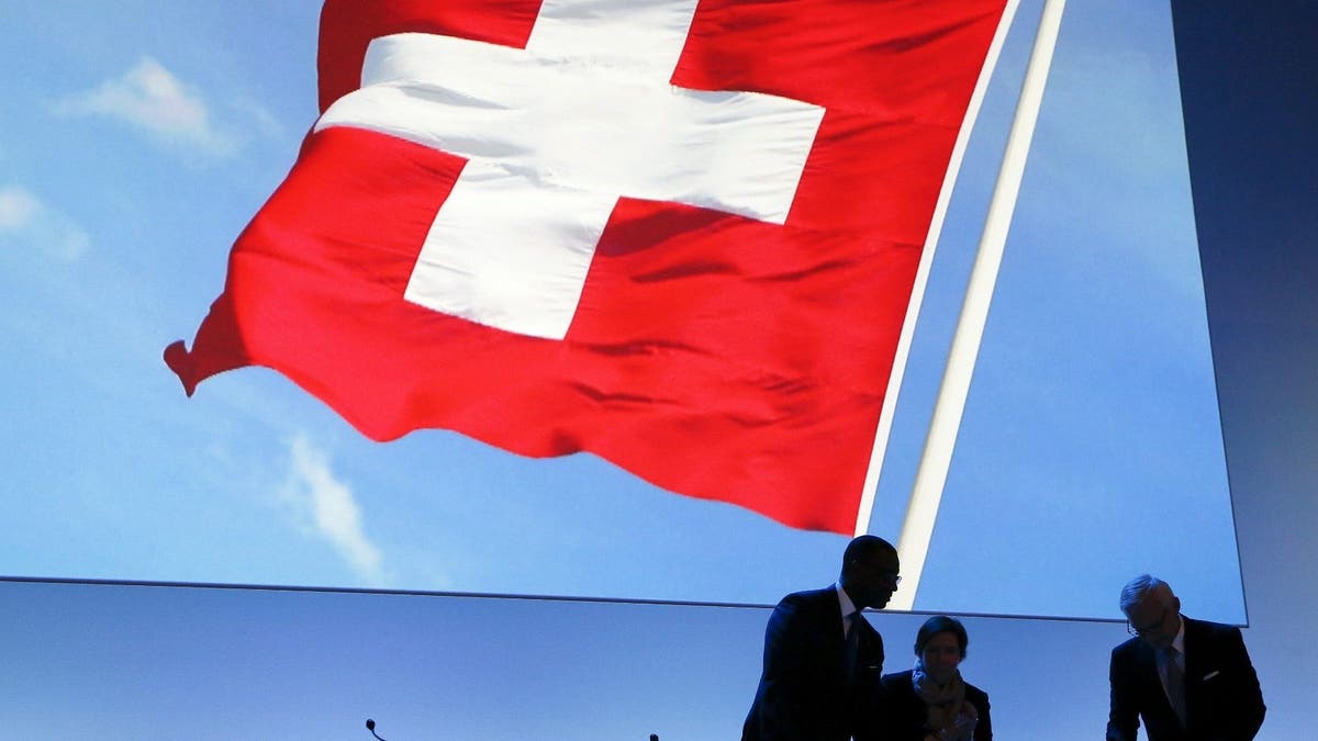 red flag with white cross