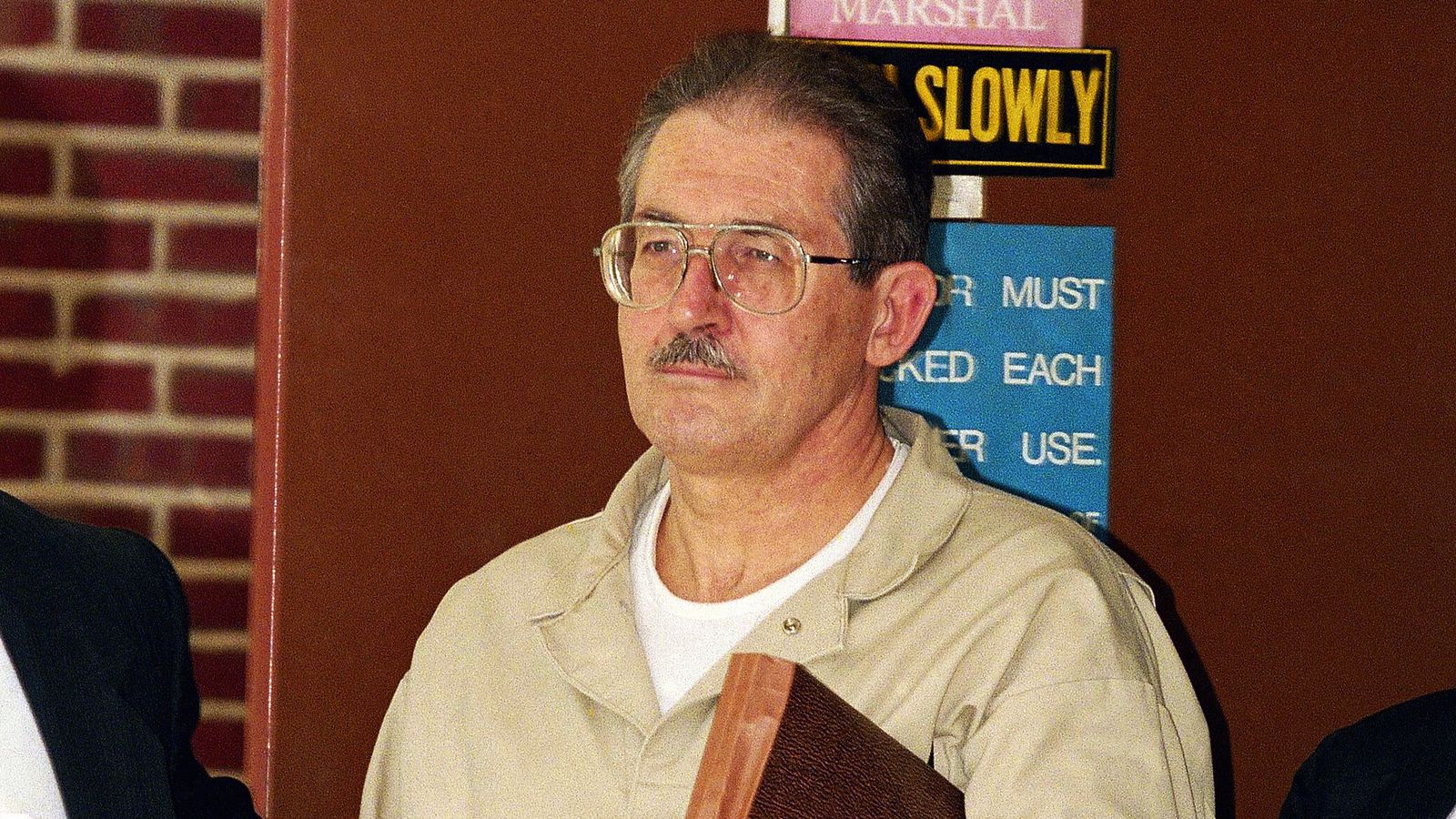Aldrich Ames leaves court after pleading guilty in 1994. Pic: AP