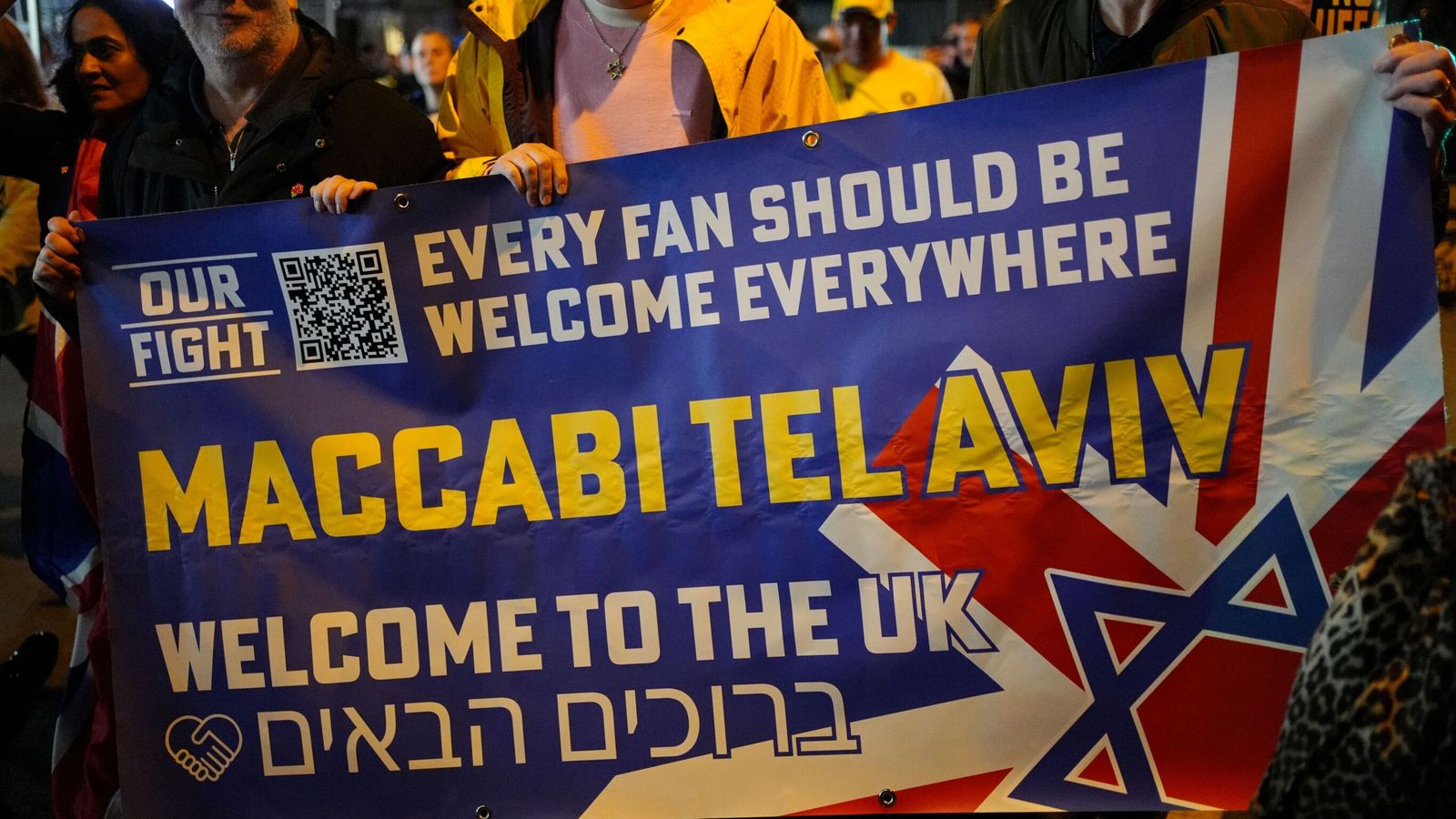 A banner being held by pro-Israel supporters outside Villa Park. Pic: PA