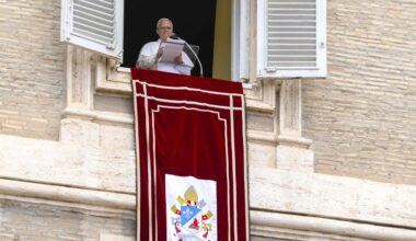 Pope Leo XIV speaks from a window of the Apostolic Palace overlooking St. Peter’s Square during the Sunday Angelus on Aug. 24, 2025.