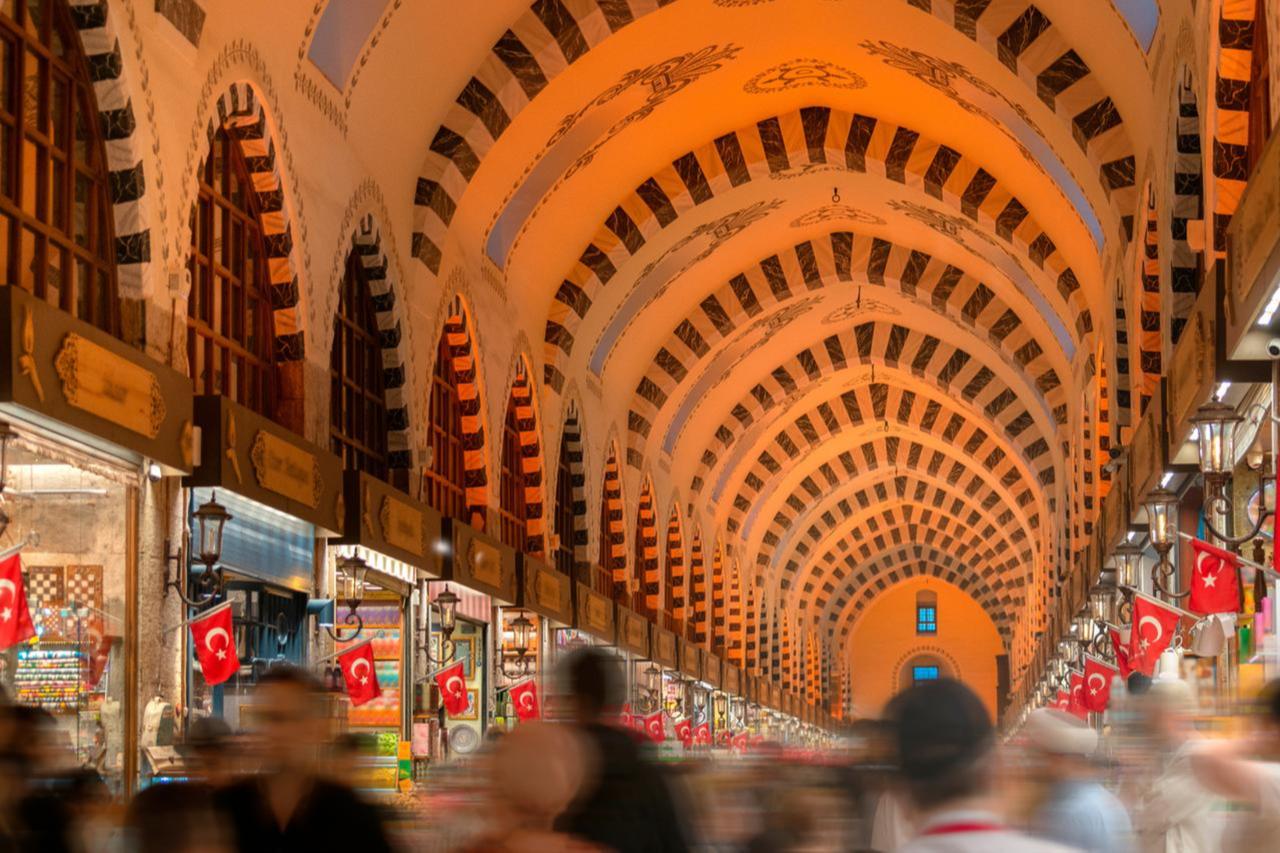 Shoppers pass through the historic Egyptian Bazaar in Istanbul, Türkiye, accessed on July 1, 2025. (Adobe Stock Photo)