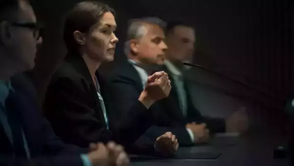 Caucasian Female Head Of Political Delegation Speaking