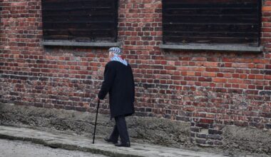 Candles flicker at Berlin's Holocaust memorial on remembrance day