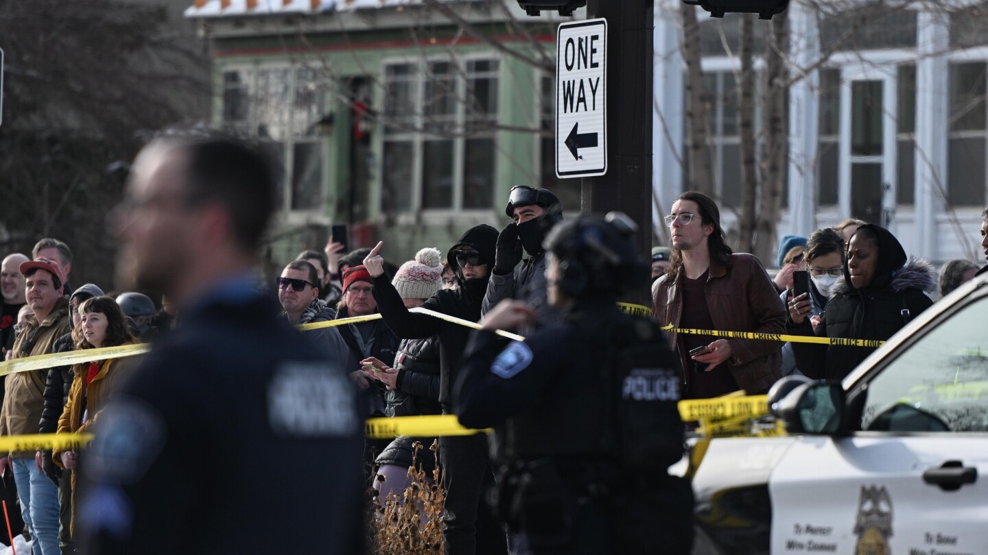 Minneapolis shooting live updates: ICE officer kills woman during immigration crackdown