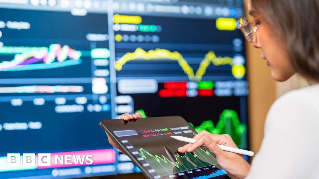 FTSE 100 hits 10,000 mark for first time.