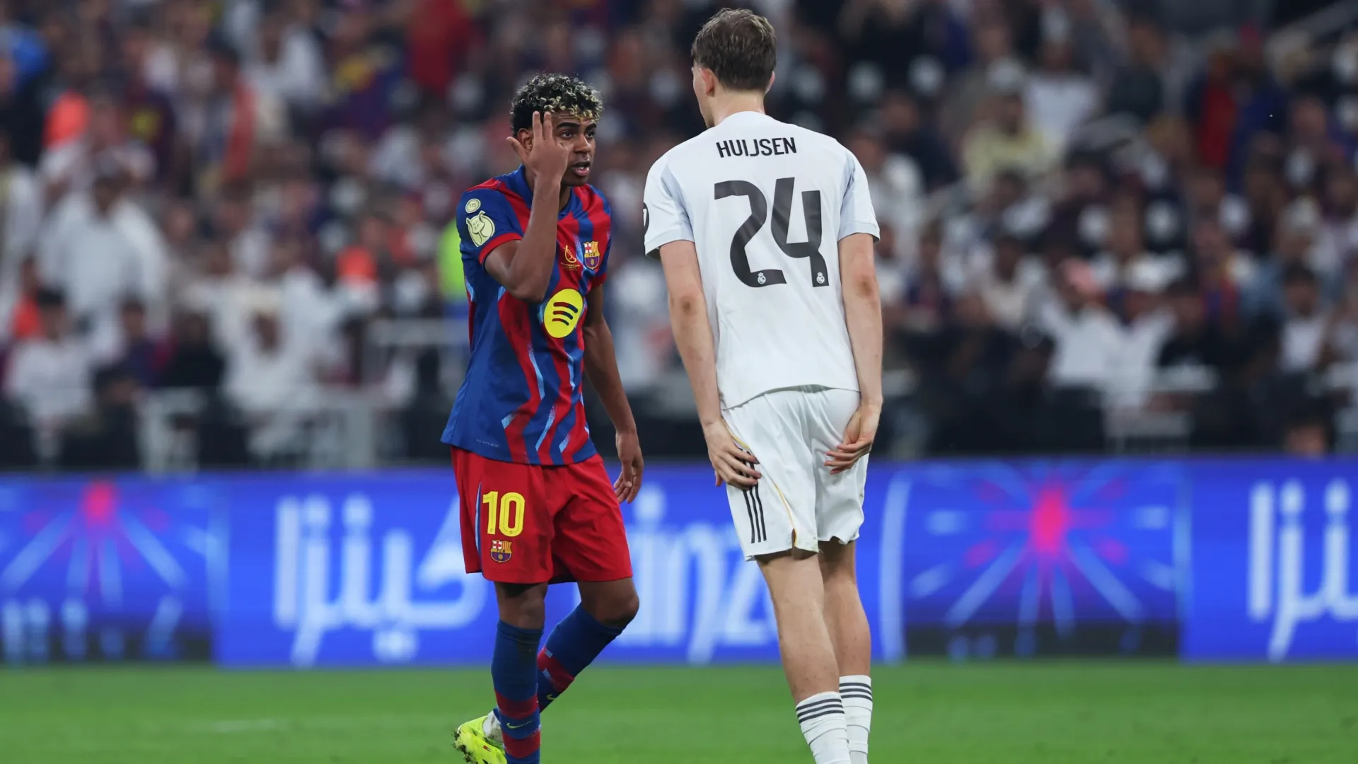 Lamine Yamal and Dean Huijsen face off during the Spanish Super Cup final.