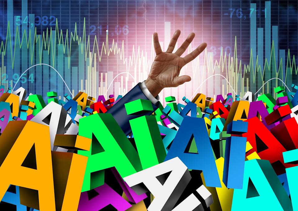 A hand reaches out over block letters spelling "AI."