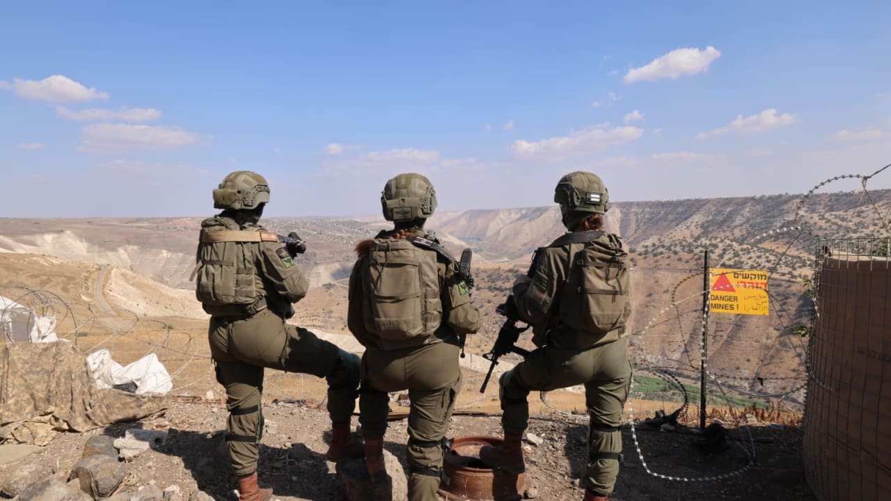 An Israeli soldier stands inside a tunnel underneath the European Hospital in Khan Yunis, in the Gaza Strip, June 8, 2025
