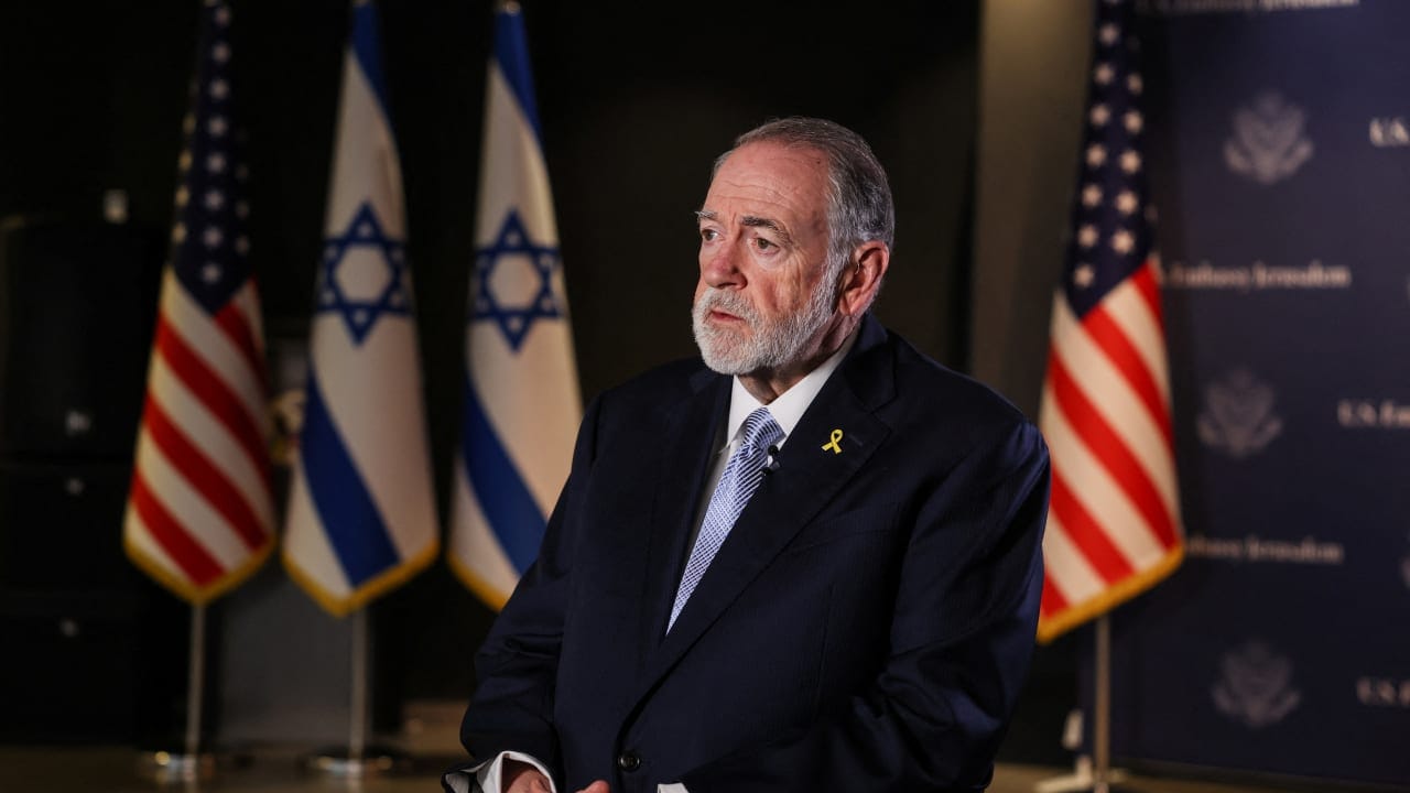 U.S. Ambassador to Israel Mike Huckabee looks on during an interview with Reuters in Jerusalem, September 10, 2025.