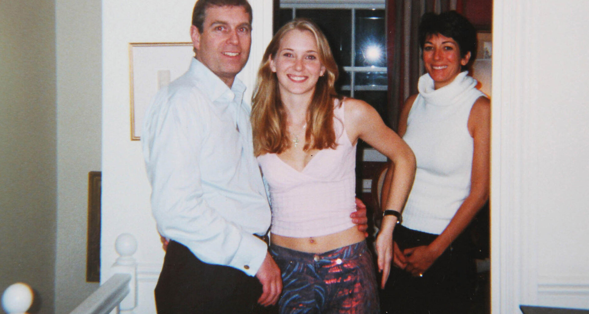 Prince Andrew with Virginia Roberts (later, Virginia Giuffre) and Ghislaine Maxwell, 2001