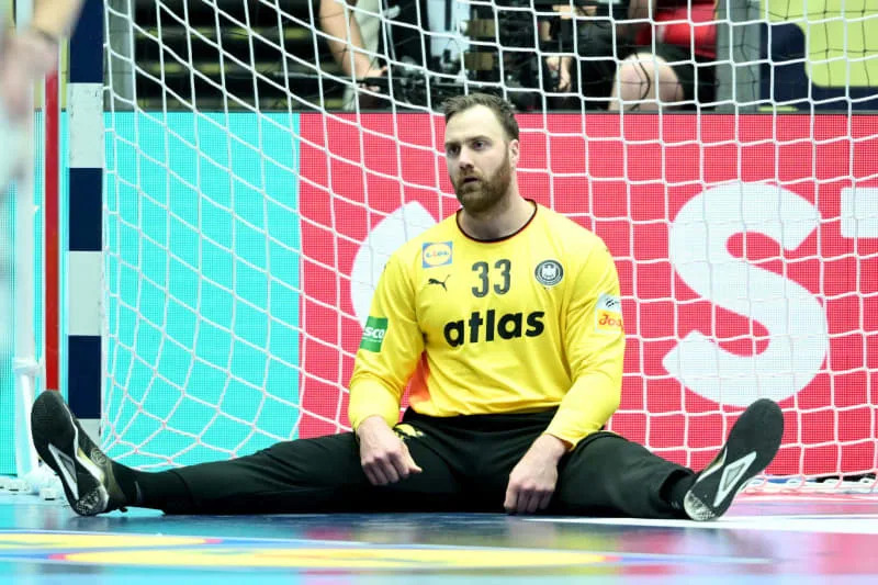 Germany goalkeeper Andreas Wolff sits on the floor during the European Men's Handball Championship final match between Germany and Denmark at the Jyske Bank Boxing. Sina Schuldt/dpa