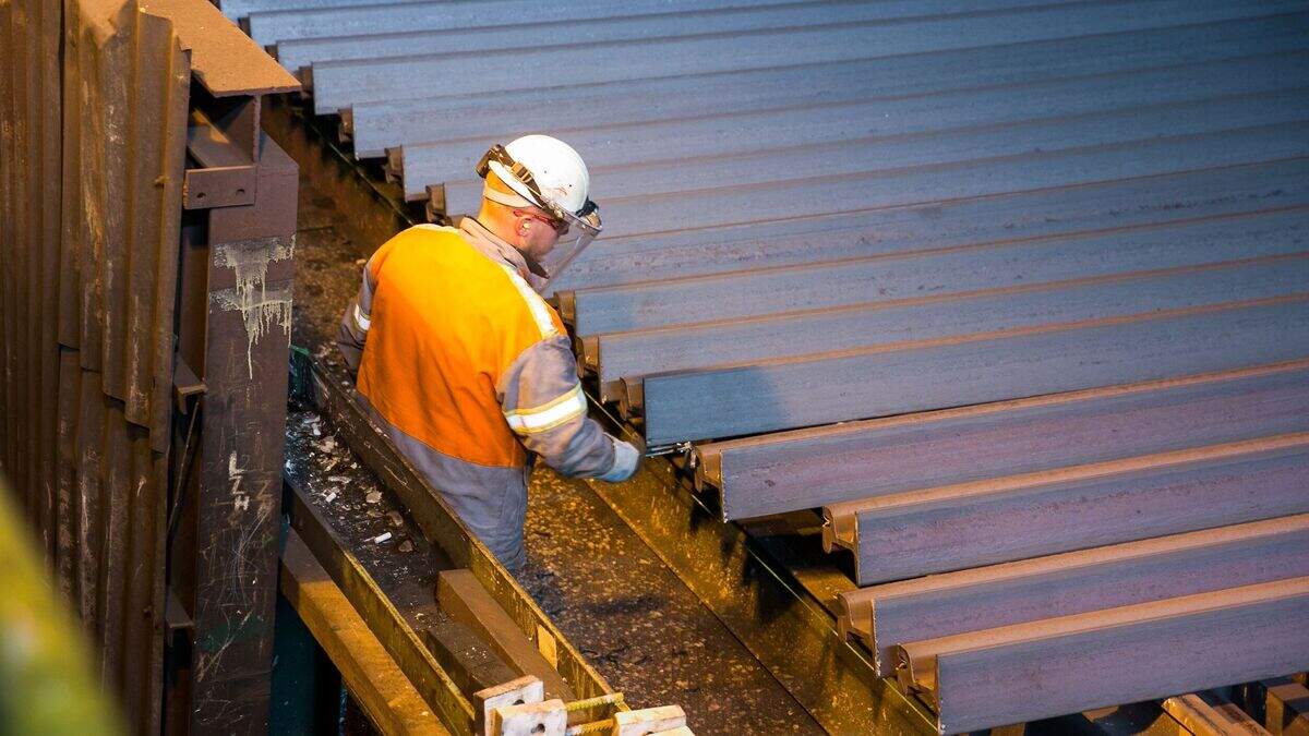 An ArcelorMittal worker at the company’s Rodange plant