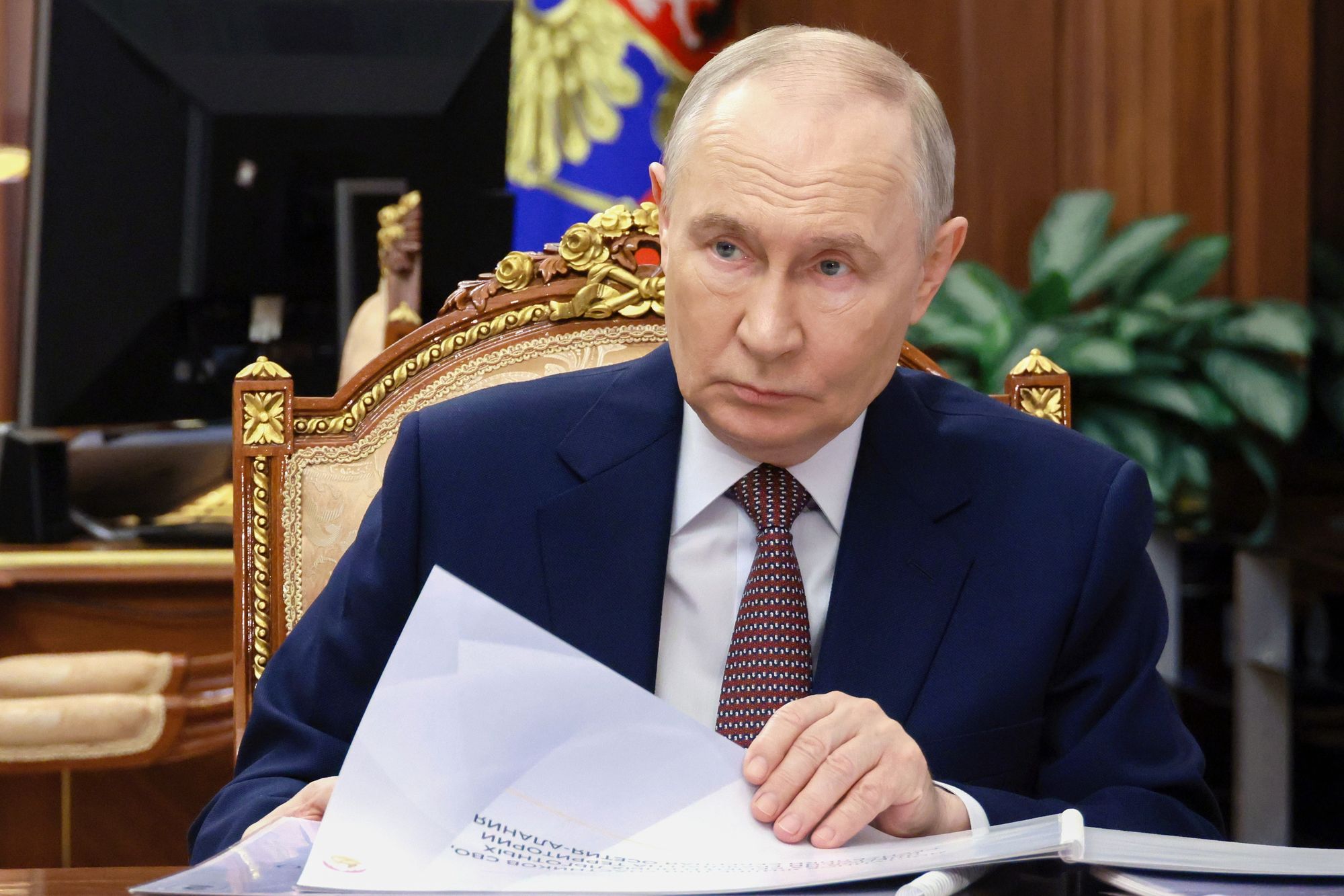 Russian president Vladimir Putin listens to the head of the North Ossetia-Alania Republic of Russia Sergei Menyailo, during their meeting at the Kremlin earlier this week