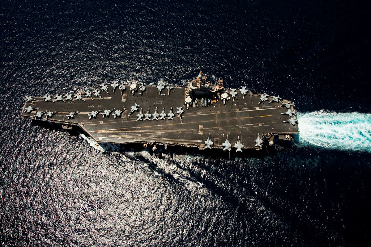 Trump-Iran latest: US military shoots down Iranian drone as Tehran demands venue change for talks