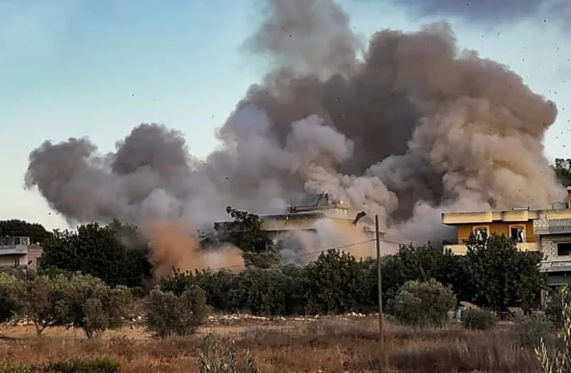 Smoke billows over Kfar Tebnit after an Israeli strike near Lebanon’s border with Israel, in Lebanon, September 18, 2025. (credit: Illustration/REUTERS/Ali Hankir TPX IMAGES OF THE DAY)