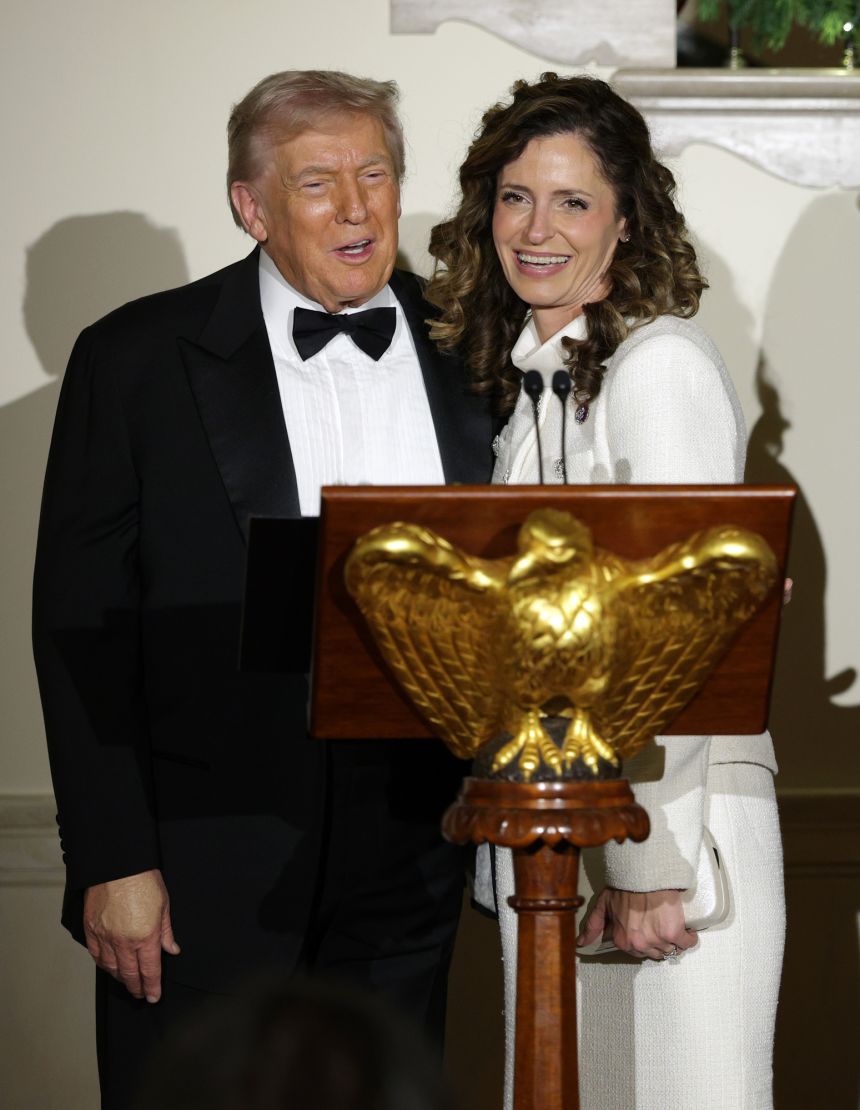 President Donald Trump stands with Republican Rep. Julia Letlow during the Congressional Ball at the Grand Foyer of the White House on December 11, 2025 in Washington, DC.
