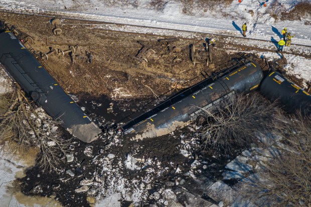 A train derailed in Mansfield Thursday morning, raising concerns of environmental contamination in a nearby waterway. The incident involved about a dozen New England Central Railroad train cars, some of which were carrying liquefied petroleum gas. (Mark Mirko/Connecticut Public)