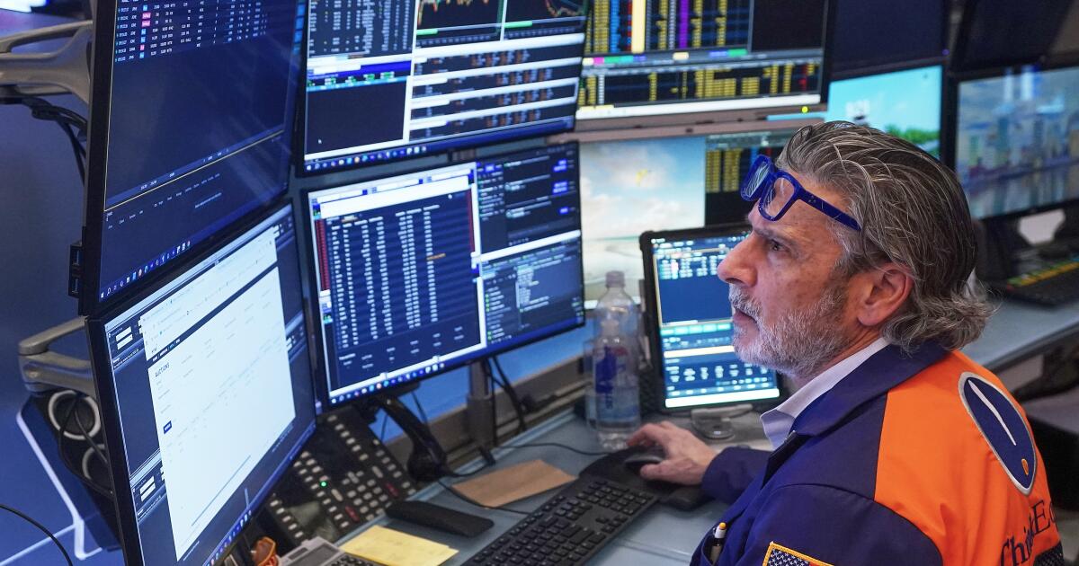 Stocks sink and oil prices rise as worries about AI, inflation, and possible war hit Wall Street