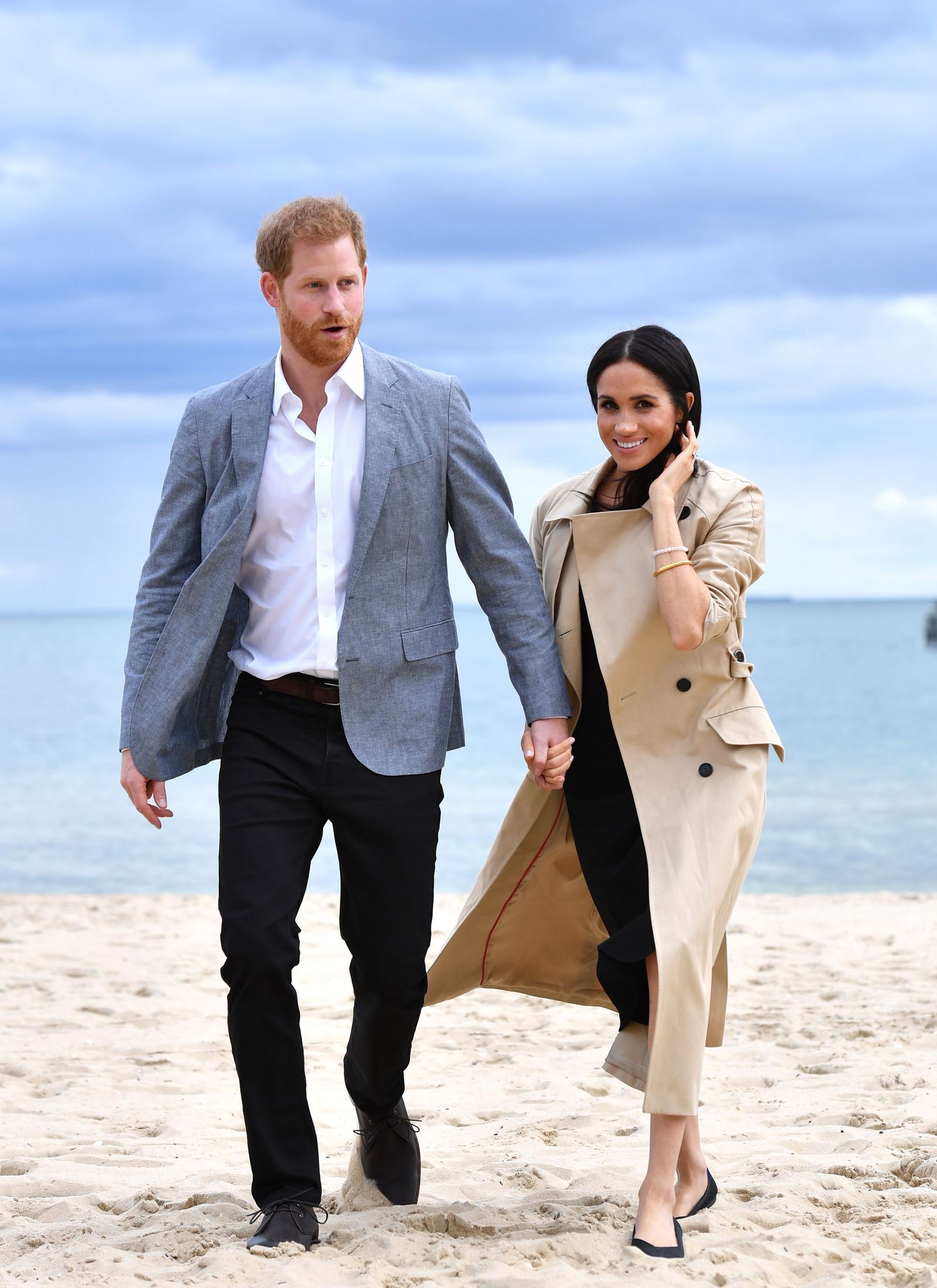 Image may contain Prince Harry Duke of Sussex Meghan Duchess of Sussex Blazer Clothing Coat Jacket and Body Part