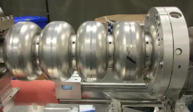 High-tech industrial machinery with large metallic components for scientific research or manufacturi.