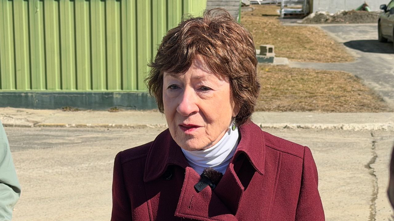 Republican Sen. Susan Collins talks to reporters outside the Hartland wastewater treatment plant on Friday. (Spectrum News/Susan Cover)