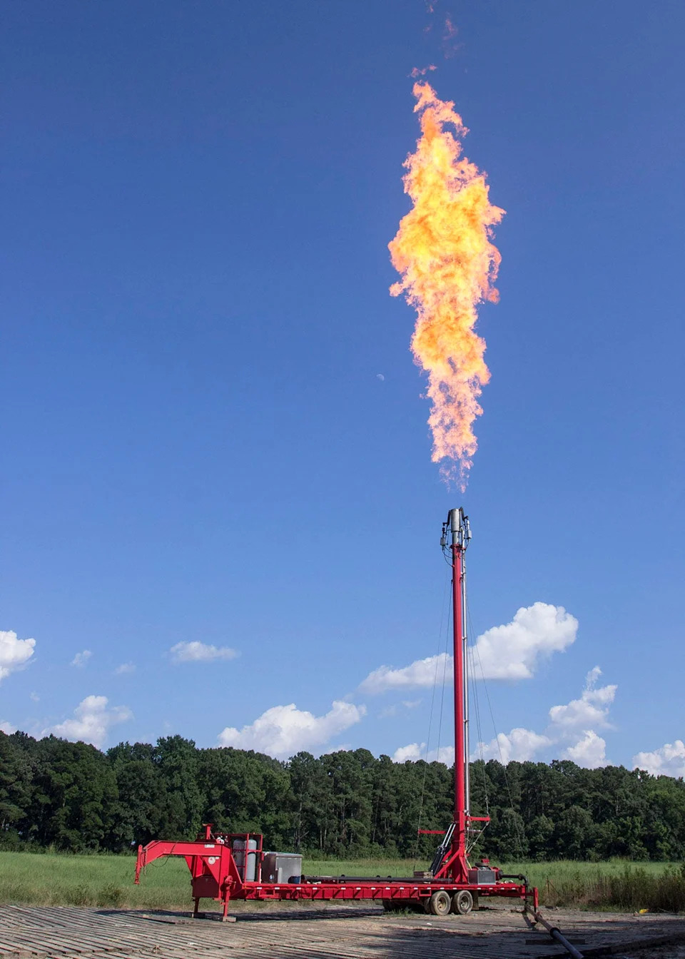 Flaring is a controlled and routine pipeline inspection process, during which Piedmont Natural Gas burns off excess natural gas using a flare stack producing a large flame.