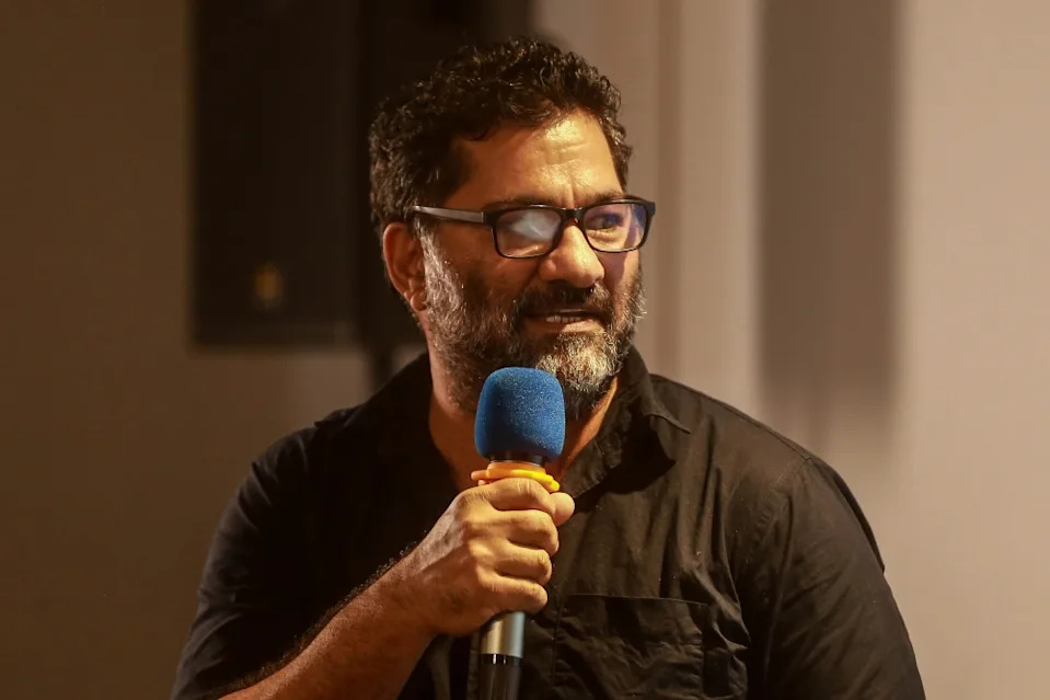 Hameed from Pakistan speaking during the International Iftar here at C-Space, Central Market. — Picture by Sayuti Zainudin