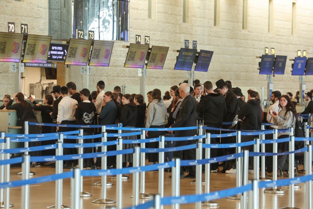 Passenger movement is seen at Ben Gurion Airport after Israel decided to limit the number of passengers on outgoing flights following damage to three private aircraft during an Iranian missile retaliation last week in Tel Aviv, Israel, on March 22, 2026. Anadolu via Getty Images