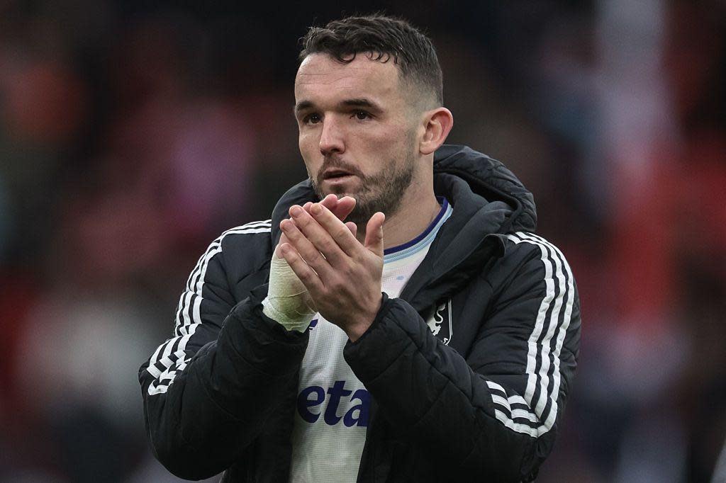 John McGinn of Aston Villa applauds