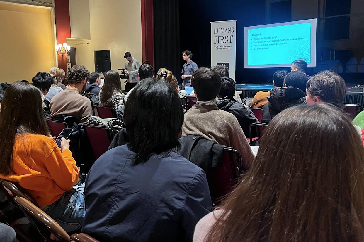 Jeremy Ornstein, a movement strategist at Humans First, explains the main campaign points with participants in New York. (Jared Perlo)