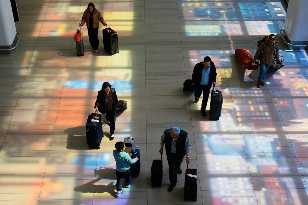 Airport waits easing as TSA says its officers got paid