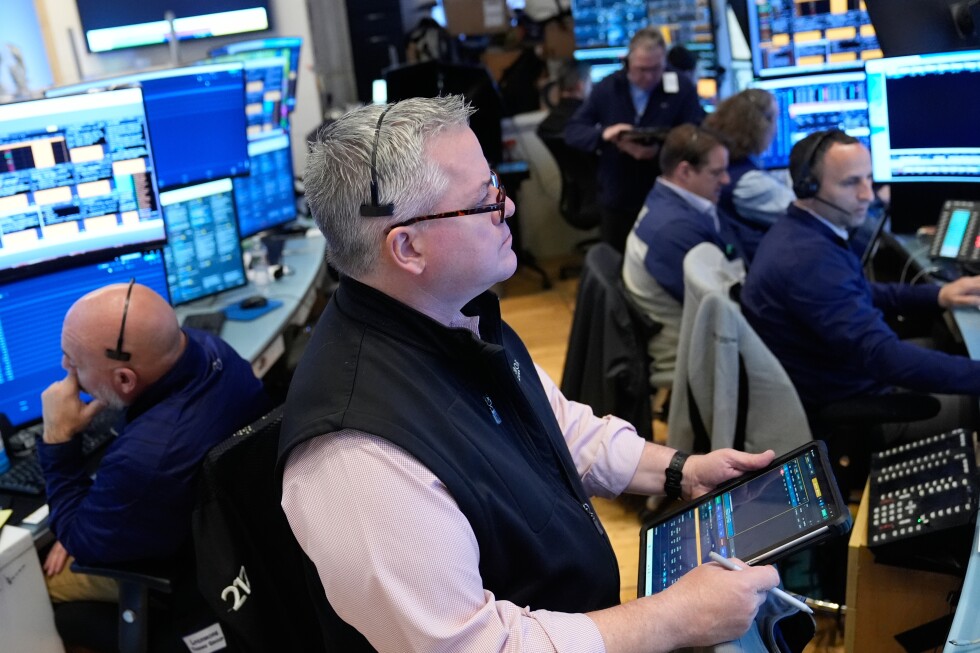 Oil prices jump and stocks are mixed as the standoff over the Strait of Hormuz persists