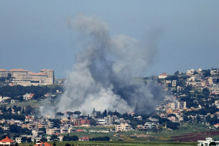 Smoke rises from the site of an Israeli strike that targeted the southern Lebanese village of Mayfadoun (-)