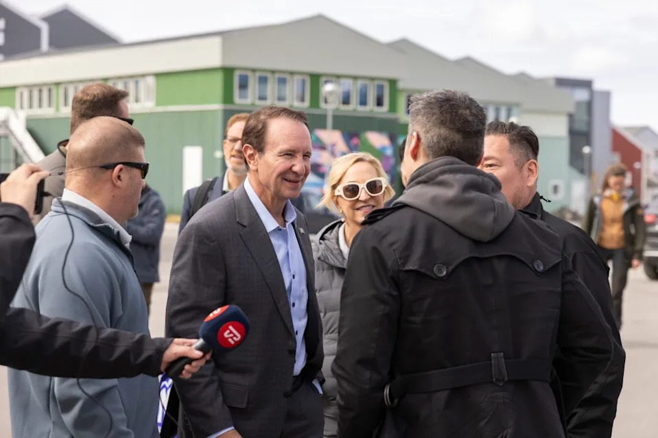 U.S. special envoy to Greenland, Republican Louisiana Governor Jeff Landry, talks with others in Nuuk, Greenland, on May 20. (Christian Klindt Soelbeck/Ritzau Scanpix via AP)
