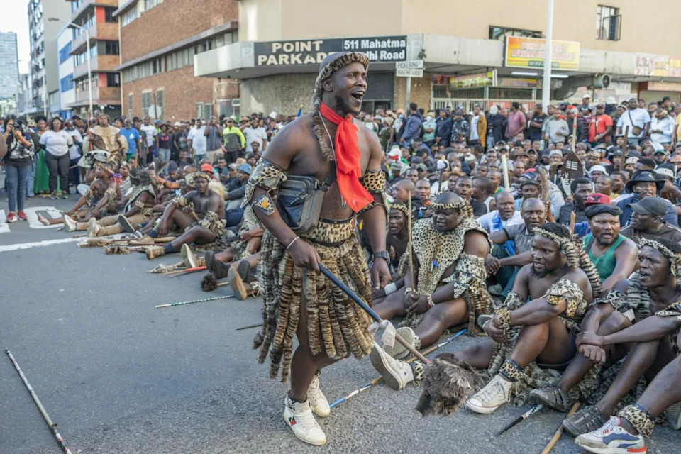 <span>Protesters sing and chant during a protest against undocumented migrants in Durban, South Africa on May 6, 2026</span><div><span>RAJESH JANTILAL</span><span>AFP</span></div>