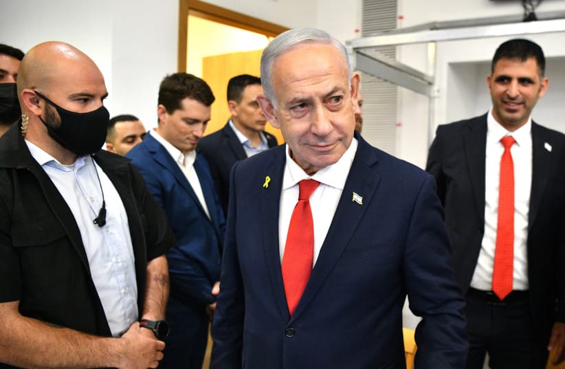 Israeli Prime Minister Benjamin Netanyahu arrives to the courtroom at the District Court in Tel Aviv, in the trial against him, October 15, 2025.