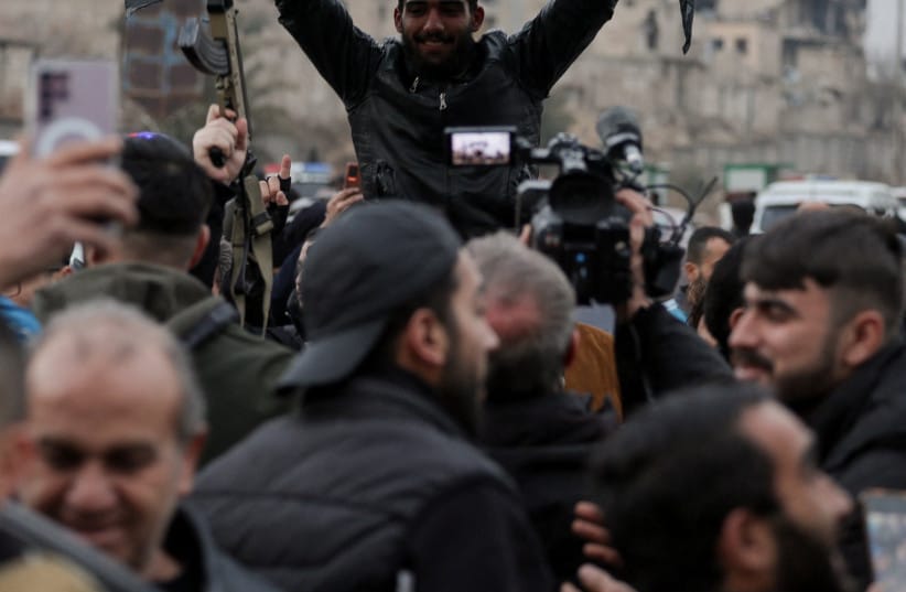 PEOPLE CELEBRATE in Sheikh Maksoud neighbourhood following the collapse of an agreement between the Syrian government and the Syrian Democratic Forces (SDF), in Aleppo, Syria, January 10, 2026.