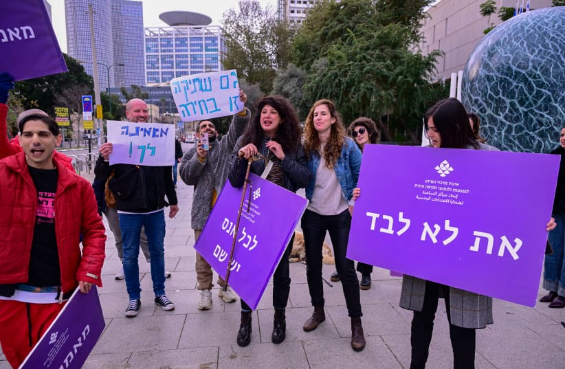 Israeli singer Shay-Li Atari Wiener, who recently revealed she was raped several years ago, protests alongside supporters outside a court hearing of her alleged rapist in Tel Aviv, January 21, 2026.